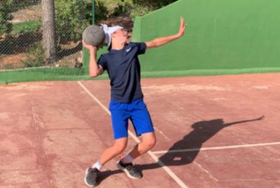 strength-and-conditioning-tennis-mallorca-boy-throwing-heavy-ball